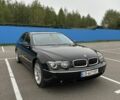 Черный БМВ 7 Серия, объемом двигателя 4.4 л и пробегом 320 тыс. км за 5700 $, фото 1 на Automoto.ua