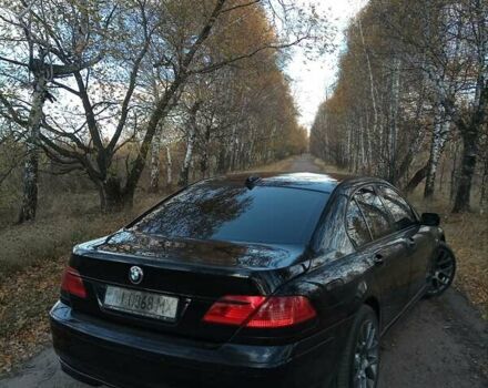 Черный БМВ 7 Серия, объемом двигателя 4.4 л и пробегом 282 тыс. км за 8000 $, фото 1 на Automoto.ua