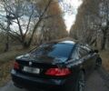 Черный БМВ 7 Серия, объемом двигателя 4.4 л и пробегом 282 тыс. км за 8000 $, фото 1 на Automoto.ua