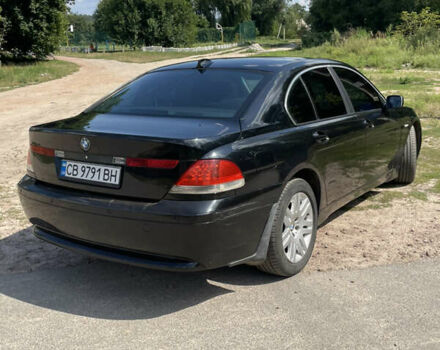 Черный БМВ 7 Серия, объемом двигателя 2.98 л и пробегом 295 тыс. км за 7000 $, фото 2 на Automoto.ua