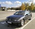 Черный БМВ 7 Серия, объемом двигателя 4.4 л и пробегом 240 тыс. км за 7000 $, фото 1 на Automoto.ua