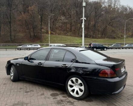 Черный БМВ 7 Серия, объемом двигателя 3 л и пробегом 305 тыс. км за 6700 $, фото 2 на Automoto.ua