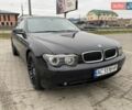 Черный БМВ 7 Серия, объемом двигателя 2.99 л и пробегом 440 тыс. км за 8300 $, фото 1 на Automoto.ua
