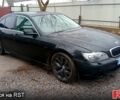 Черный БМВ 7 Серия, объемом двигателя 4.4 л и пробегом 345 тыс. км за 5600 $, фото 1 на Automoto.ua