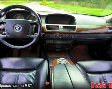 Чорний БМВ 7 Серія, об'ємом двигуна 4.4 л та пробігом 410 тис. км за 7700 $, фото 2 на Automoto.ua