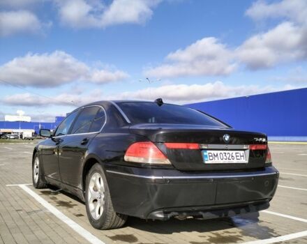 Черный БМВ 7 Серия, объемом двигателя 4.4 л и пробегом 240 тыс. км за 7000 $, фото 2 на Automoto.ua