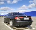 Черный БМВ 7 Серия, объемом двигателя 4.4 л и пробегом 240 тыс. км за 7000 $, фото 2 на Automoto.ua