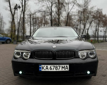 Черный БМВ 7 Серия, объемом двигателя 2.99 л и пробегом 306 тыс. км за 6700 $, фото 1 на Automoto.ua