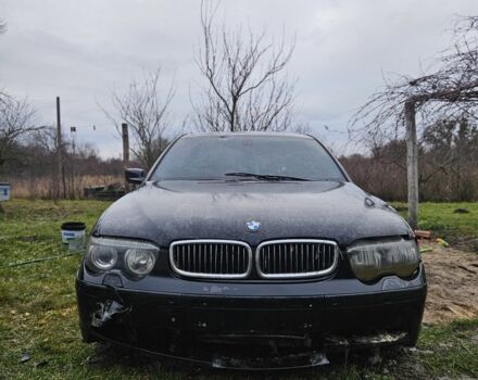 Черный БМВ 7 Серия, объемом двигателя 3 л и пробегом 300 тыс. км за 2700 $, фото 1 на Automoto.ua