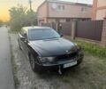 Черный БМВ 7 Серия, объемом двигателя 4.4 л и пробегом 330 тыс. км за 3500 $, фото 1 на Automoto.ua