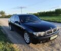 Черный БМВ 7 Серия, объемом двигателя 2.99 л и пробегом 421 тыс. км за 7500 $, фото 1 на Automoto.ua