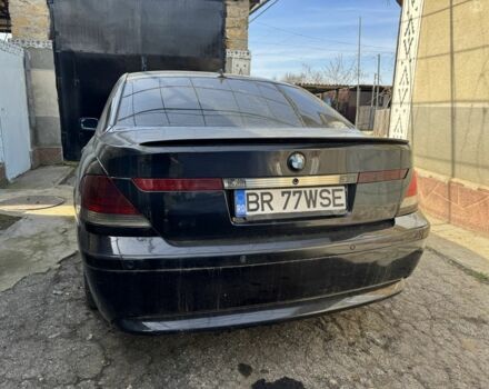 Черный БМВ 7 Серия, объемом двигателя 3 л и пробегом 400 тыс. км за 2500 $, фото 1 на Automoto.ua
