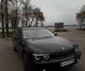 Черный БМВ 7 Серия, объемом двигателя 3 л и пробегом 305 тыс. км за 6650 $, фото 1 на Automoto.ua
