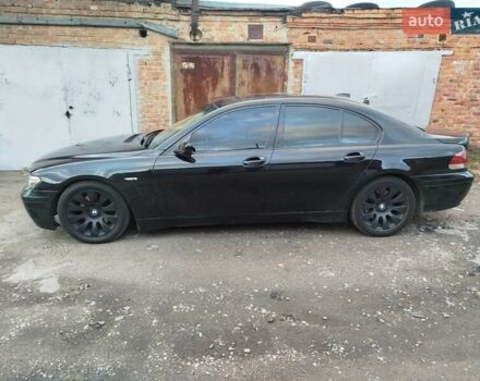 Черный БМВ 7 Серия, объемом двигателя 4.4 л и пробегом 407 тыс. км за 5600 $, фото 6 на Automoto.ua