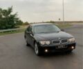 Черный БМВ 7 Серия, объемом двигателя 3 л и пробегом 400 тыс. км за 4200 $, фото 1 на Automoto.ua