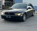 Черный БМВ 7 Серия, объемом двигателя 3 л и пробегом 200 тыс. км за 5000 $, фото 1 на Automoto.ua
