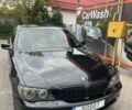 Черный БМВ 7 Серия, объемом двигателя 4 л и пробегом 308 тыс. км за 9000 $, фото 1 на Automoto.ua