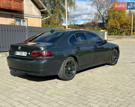 Черный БМВ 7 Серия, объемом двигателя 4 л и пробегом 403 тыс. км за 8500 $, фото 1 на Automoto.ua