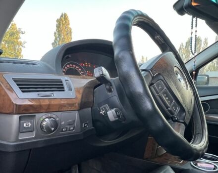 Черный БМВ 7 Серия, объемом двигателя 3 л и пробегом 200 тыс. км за 5000 $, фото 16 на Automoto.ua