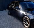 Черный БМВ 7 Серия, объемом двигателя 4 л и пробегом 500 тыс. км за 8500 $, фото 1 на Automoto.ua