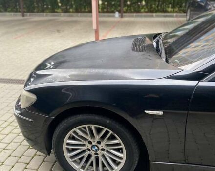 Черный БМВ 7 Серия, объемом двигателя 2.99 л и пробегом 430 тыс. км за 6500 $, фото 1 на Automoto.ua