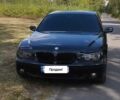 Черный БМВ 7 Серия, объемом двигателя 4 л и пробегом 268 тыс. км за 8500 $, фото 1 на Automoto.ua