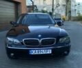 Чорний БМВ 7 Серія, об'ємом двигуна 4 л та пробігом 200 тис. км за 11000 $, фото 1 на Automoto.ua