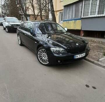 Черный БМВ 7 Серия, объемом двигателя 4.4 л и пробегом 333 тыс. км за 11000 $, фото 1 на Automoto.ua