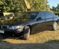 Чорний БМВ 7 Серія, об'ємом двигуна 4 л та пробігом 210 тис. км за 7700 $, фото 1 на Automoto.ua