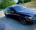 Чорний БМВ 7 Серія, об'ємом двигуна 3 л та пробігом 408 тис. км за 7750 $, фото 1 на Automoto.ua