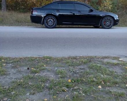 Черный БМВ 7 Серия, объемом двигателя 4.8 л и пробегом 331 тыс. км за 10500 $, фото 6 на Automoto.ua