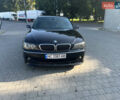 Черный БМВ 7 Серия, объемом двигателя 4.8 л и пробегом 278 тыс. км за 10500 $, фото 1 на Automoto.ua
