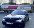 Черный БМВ 7 Серия, объемом двигателя 4.4 л и пробегом 333 тыс. км за 11000 $, фото 1 на Automoto.ua