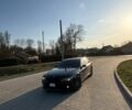 Чорний БМВ 7 Серія, об'ємом двигуна 4 л та пробігом 300 тис. км за 8099 $, фото 1 на Automoto.ua
