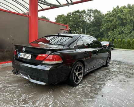 Черный БМВ 7 Серия, объемом двигателя 4 л и пробегом 220 тыс. км за 9500 $, фото 2 на Automoto.ua