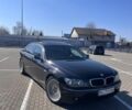 Черный БМВ 7 Серия, объемом двигателя 4 л и пробегом 360 тыс. км за 9500 $, фото 1 на Automoto.ua