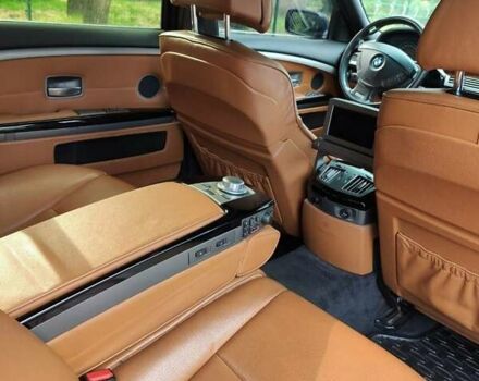 Черный БМВ 7 Серия, объемом двигателя 4.8 л и пробегом 224 тыс. км за 14000 $, фото 12 на Automoto.ua