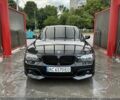 Черный БМВ 7 Серия, объемом двигателя 4 л и пробегом 220 тыс. км за 9500 $, фото 1 на Automoto.ua