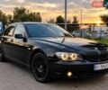 Чорний БМВ 7 Серія, об'ємом двигуна 4.4 л та пробігом 242 тис. км за 8129 $, фото 1 на Automoto.ua