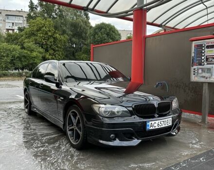 Черный БМВ 7 Серия, объемом двигателя 4 л и пробегом 220 тыс. км за 9500 $, фото 1 на Automoto.ua