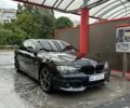 Черный БМВ 7 Серия, объемом двигателя 4 л и пробегом 220 тыс. км за 9500 $, фото 1 на Automoto.ua