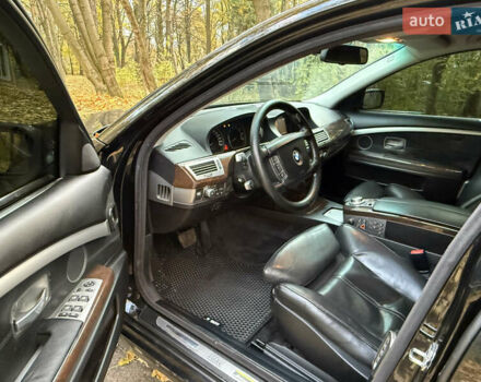 Черный БМВ 7 Серия, объемом двигателя 4.8 л и пробегом 270 тыс. км за 7350 $, фото 24 на Automoto.ua