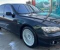Черный БМВ 7 Серия, объемом двигателя 4 л и пробегом 256 тыс. км за 7500 $, фото 1 на Automoto.ua