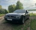 Черный БМВ 7 Серия, объемом двигателя 3 л и пробегом 321 тыс. км за 3400 $, фото 1 на Automoto.ua