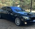 Черный БМВ 7 Серия, объемом двигателя 4.4 л и пробегом 175 тыс. км за 12000 $, фото 1 на Automoto.ua