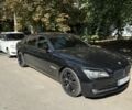 Черный БМВ 7 Серия, объемом двигателя 4.4 л и пробегом 200 тыс. км за 9600 $, фото 1 на Automoto.ua