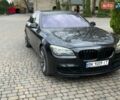 Черный БМВ 7 Серия, объемом двигателя 2.99 л и пробегом 341 тыс. км за 14500 $, фото 1 на Automoto.ua