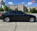 Черный БМВ 7 Серия, объемом двигателя 3 л и пробегом 329 тыс. км за 17000 $, фото 1 на Automoto.ua