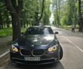 Черный БМВ 7 Серия, объемом двигателя 3 л и пробегом 271 тыс. км за 14800 $, фото 1 на Automoto.ua
