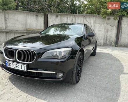 Черный БМВ 7 Серия, объемом двигателя 2.99 л и пробегом 311 тыс. км за 14300 $, фото 1 на Automoto.ua
